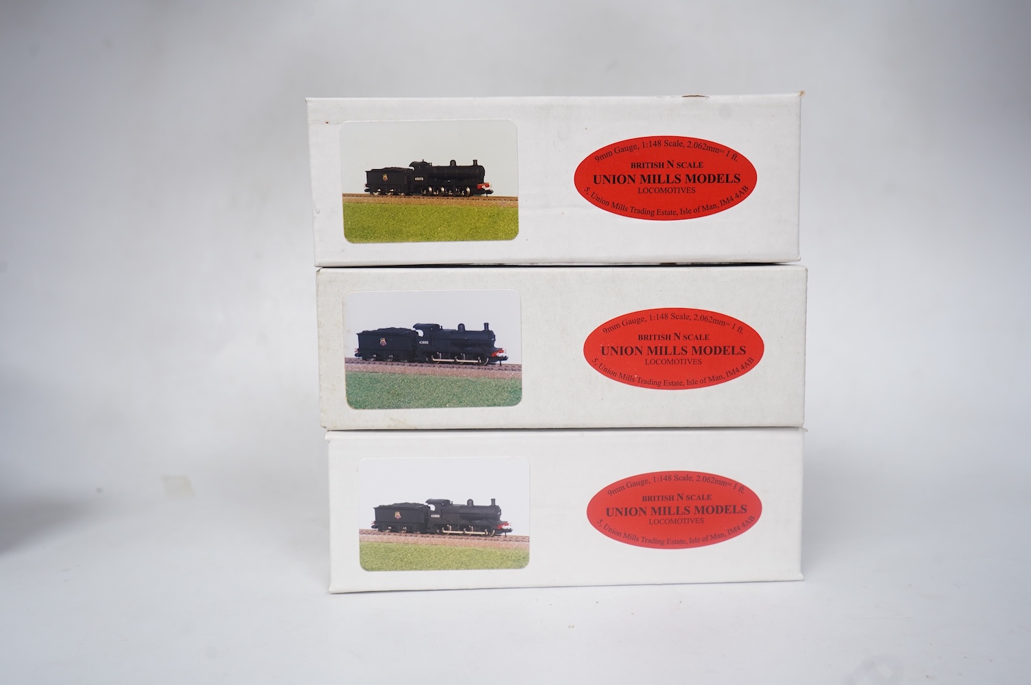 Three boxed Union Mills Models N gauge railway BR locomotives; a Class 3F, 43808, a Class 3F, 43808, and a Class G2, 49078. Condition - good.
